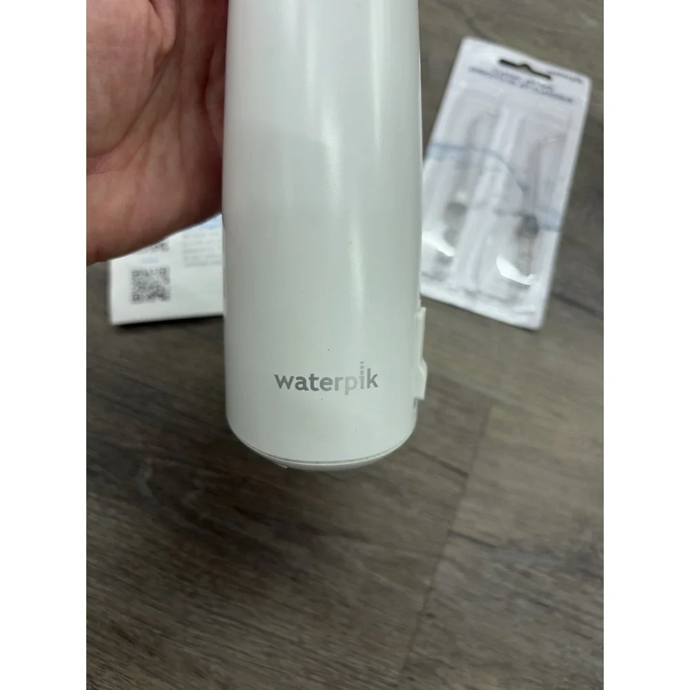 Waterpik Cordless Pulse 3100 Rechargeable Portable Water Flosser With 2 New Tips